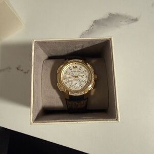 Michael Kors Gold Tone Watch with Black Strap and Crystal Accents